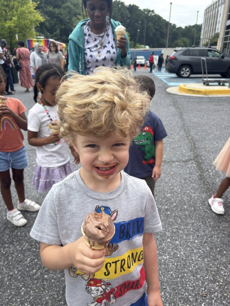 Boy with ice cream all over his face